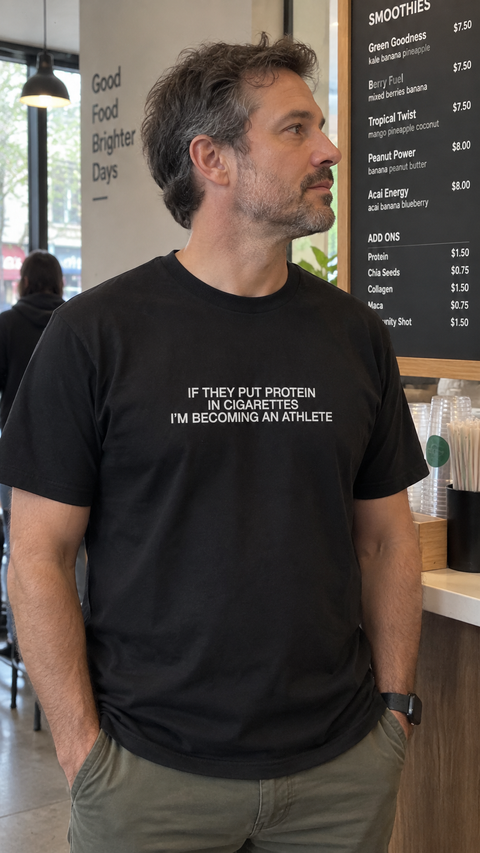 IF THEY PUT PROTEIN IN CIGARETTES I’M BECOMING AN ATHLETE Black Tee